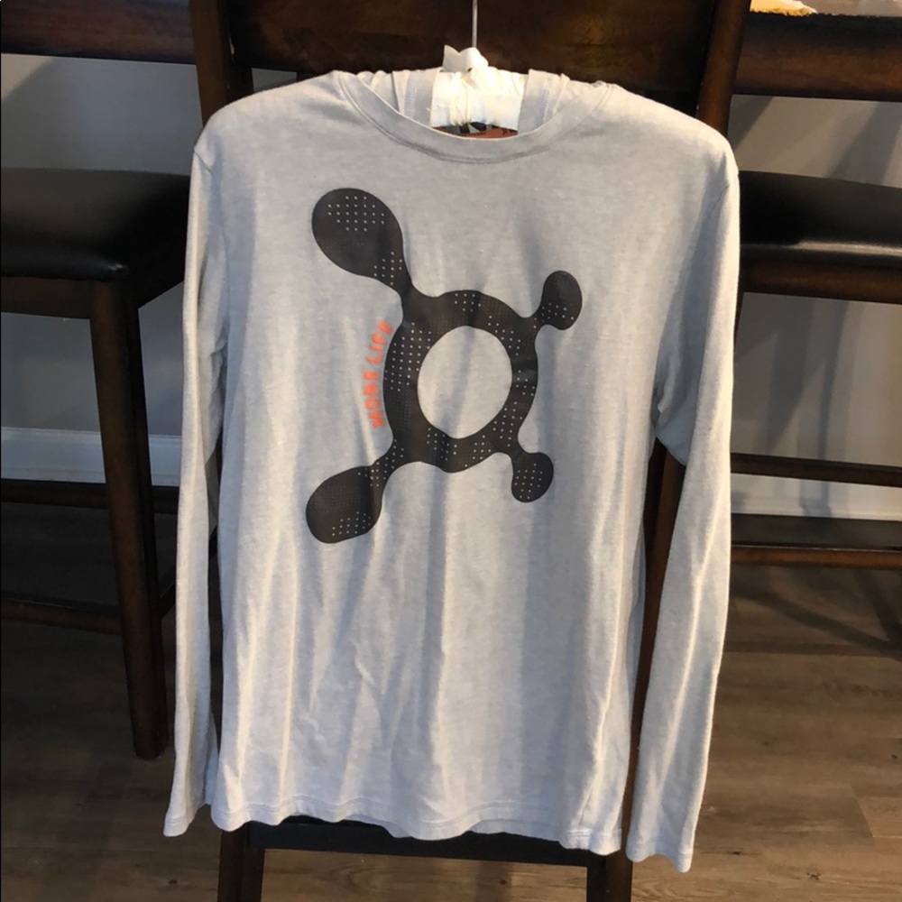 Light grey hooded long sleeve Orangetheory shirt